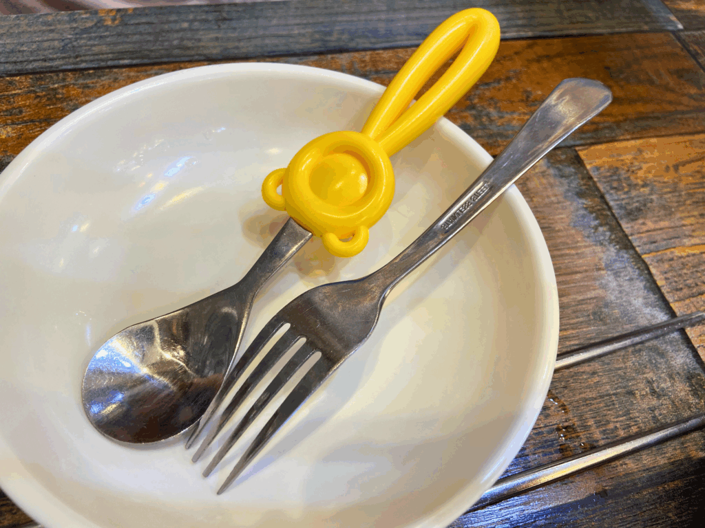 A child’s spoon and fork provided at Shinsegye Jjimdak.